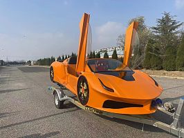 A supercar on the sea surface